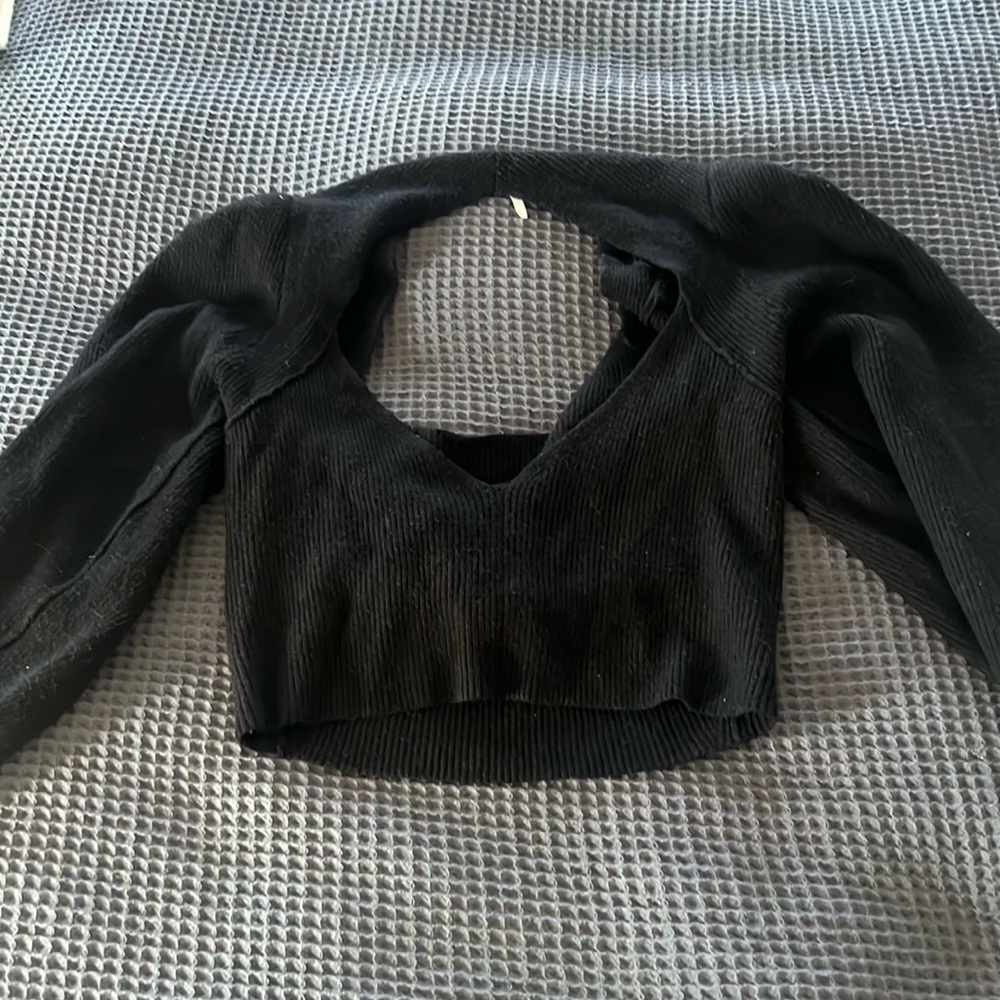 Black Free People sweater with cutouts, size L